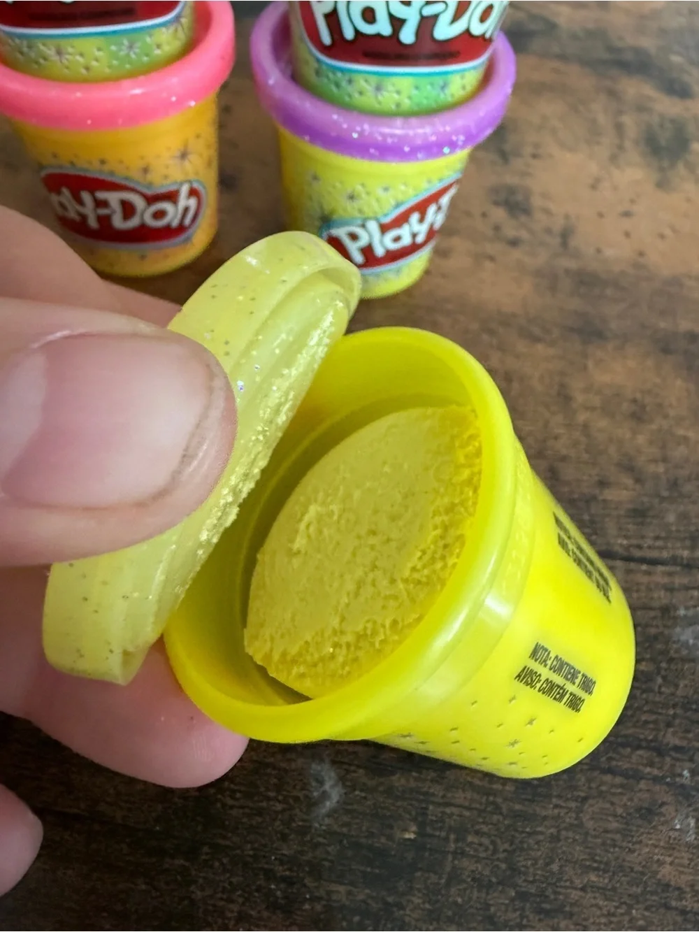 Play-Doh small Yellow with Pink, Teal, Purple, and Green Lids comes with all